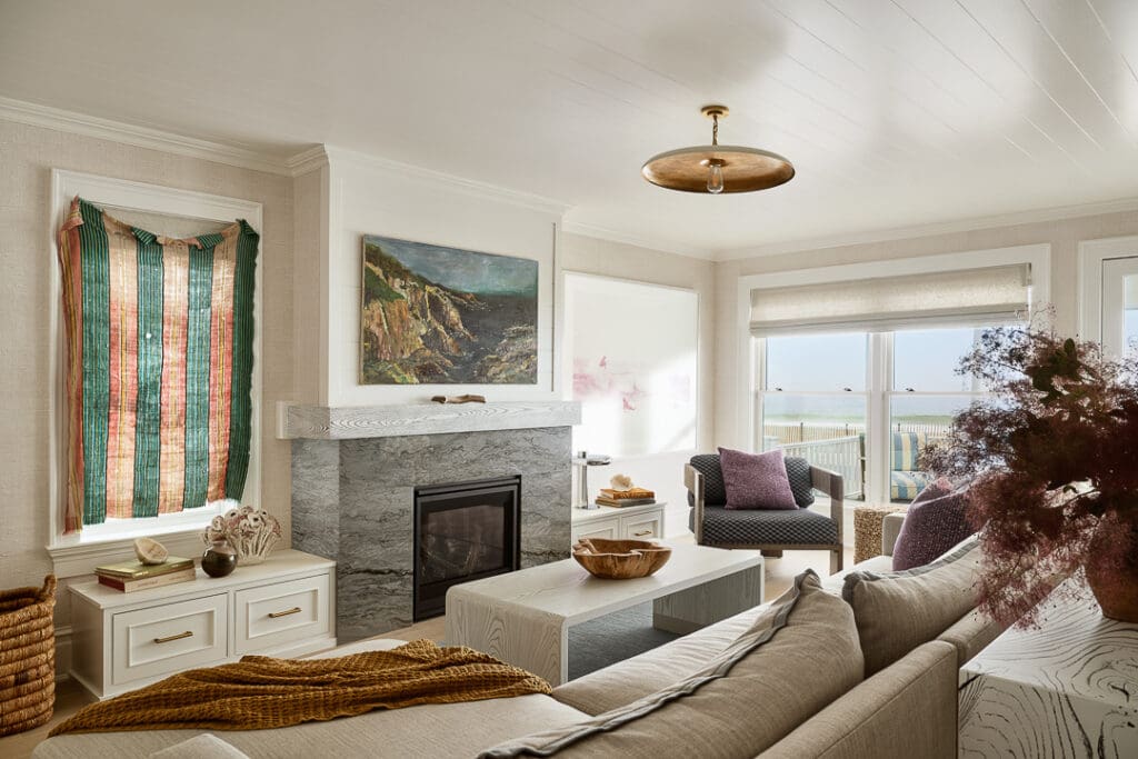 Editorial interior photograph of a coastal living space emphasizing texture and light