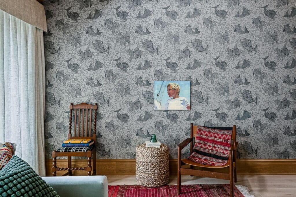 Editorial interior photograph of a coastal living space emphasizing texture and light